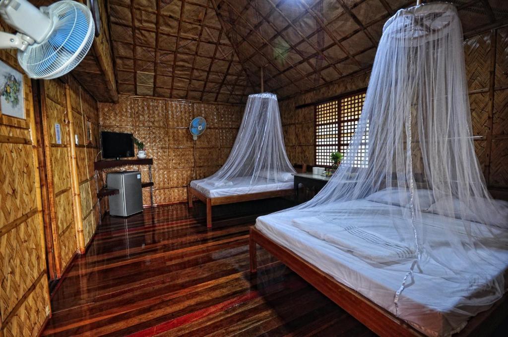 Villa De Pico Highland Beach Resort Puerto Galera Chambre photo